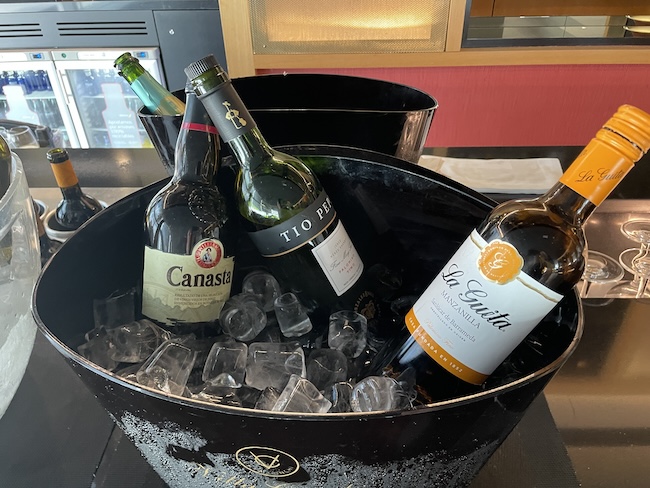 a bucket of wine bottles and ice