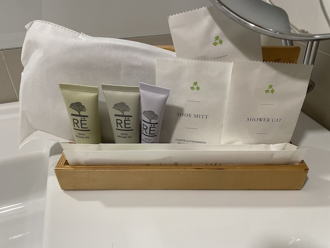 a group of toiletries in a wooden box