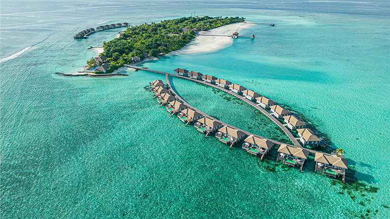 a group of houses in the water