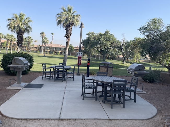 a picnic area with tables and chairs