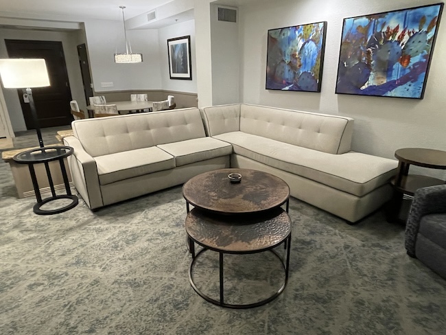 a living room with a couch and coffee table