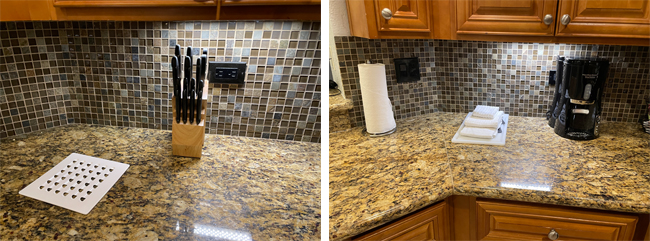 a kitchen counter with a roll of paper towels