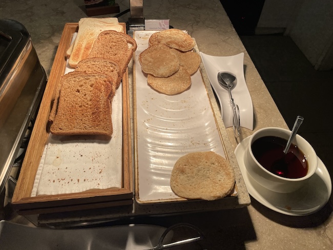 a tray of toast and a cup of tea