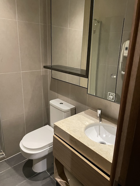 a bathroom with a sink and mirror