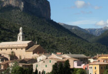 a group of buildings in a valley