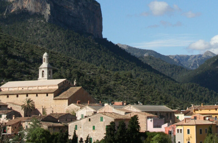 a group of buildings in a valley