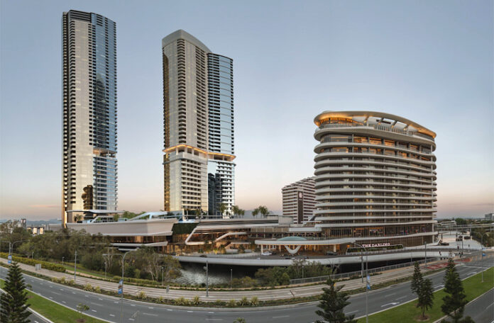 a group of tall buildings next to a road