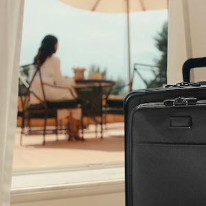 a suitcase in front of a window