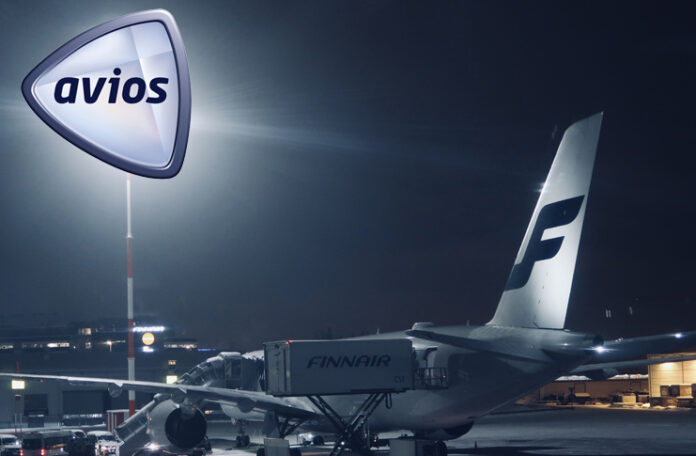 a plane on the runway at night