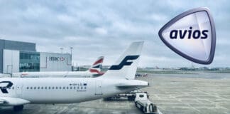 a group of airplanes parked on a runway