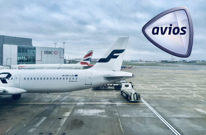 a group of airplanes parked on a runway