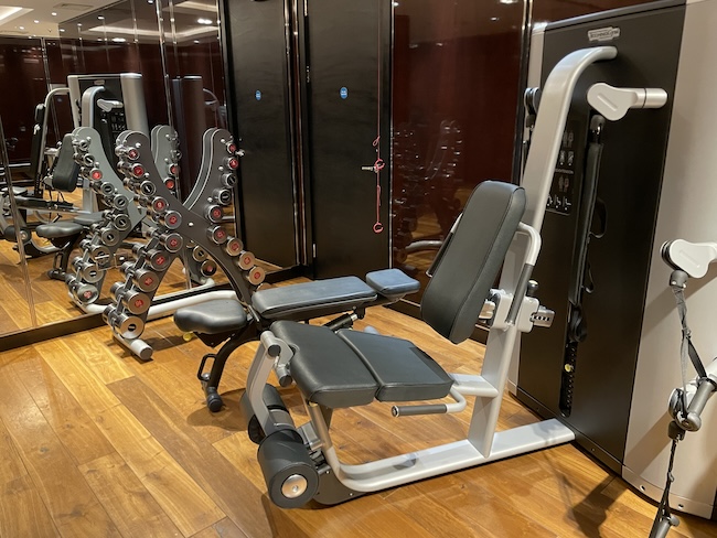 a group of exercise equipment in a room