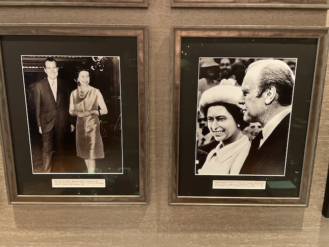 a couple of framed photos of a man and woman