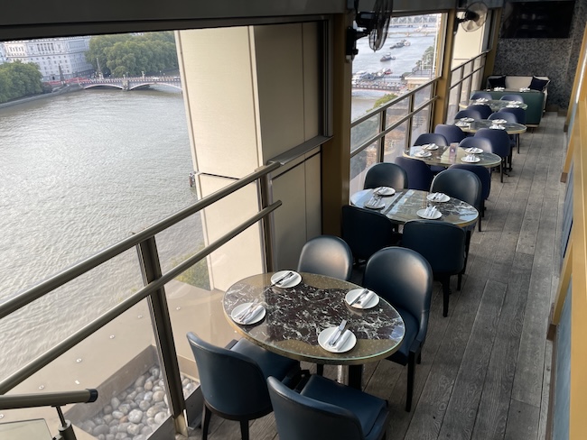 a restaurant with tables and chairs