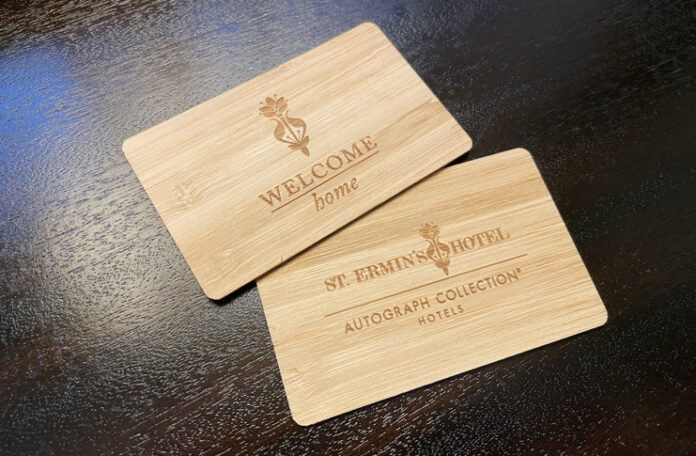 a couple of wooden business cards