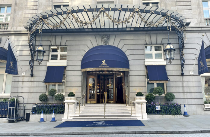 a building with a blue awning