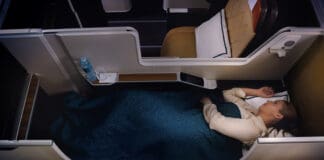 a woman lying in a bed
