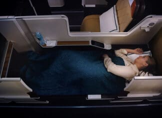 a woman lying in a bed
