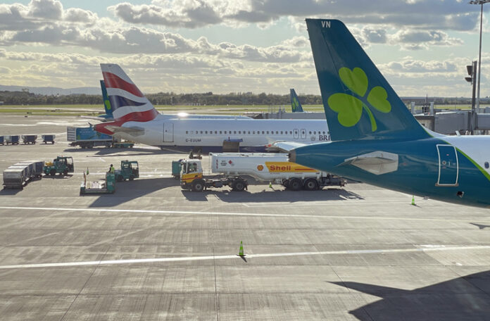 airplanes parked on a runway