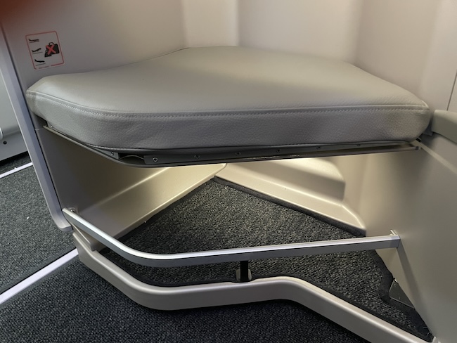 Iberia A321XLR Business Class seat storage under the ottoman.