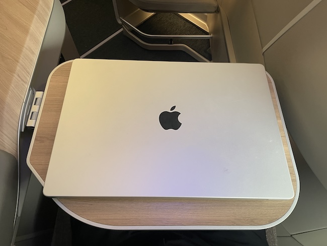 Iberia A321XLR Business Class tray table with 16" MacBook.