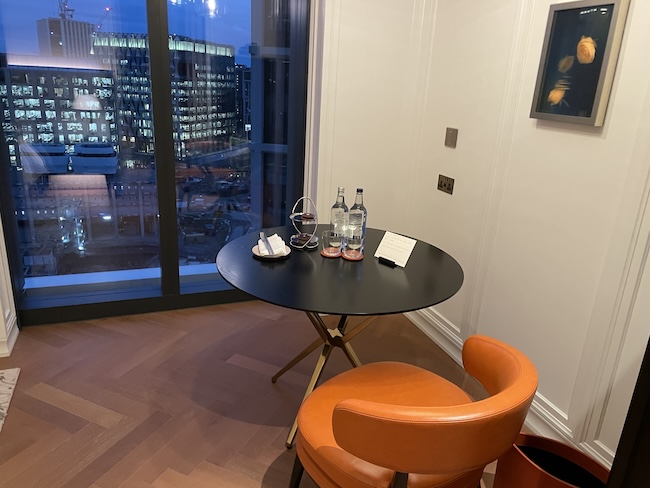 a table with bottles and glasses on it