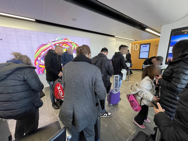 a group of people standing in a line