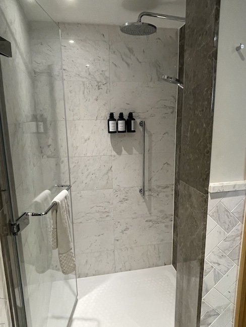 a shower with a glass door