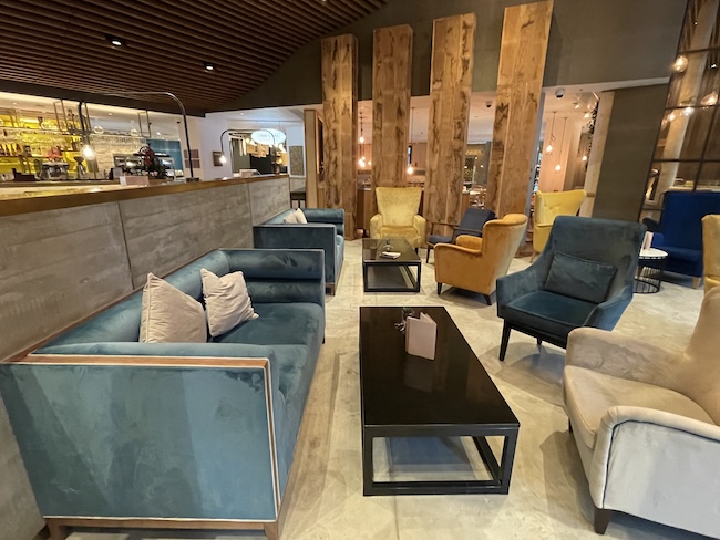 a room with couches and tables