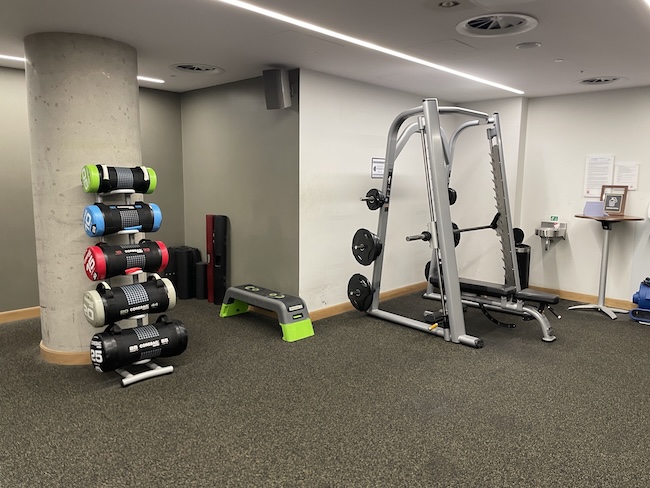 a gym with weights and equipment