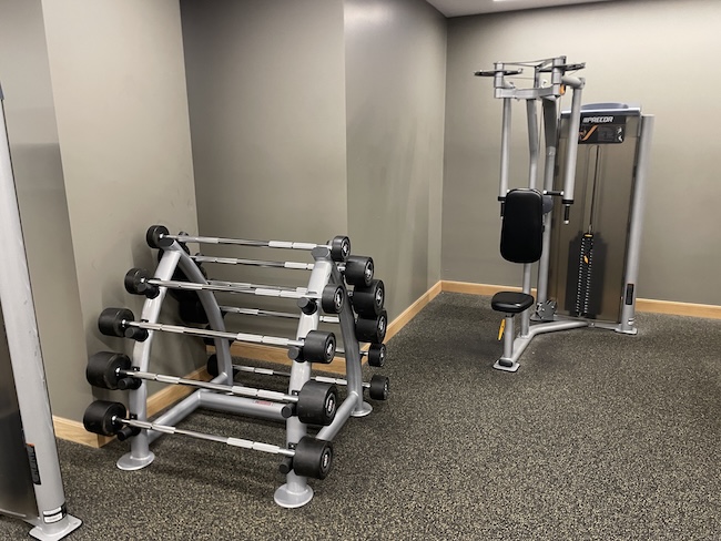 a gym with weights and exercise equipment