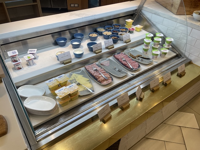 a display case with food items on it