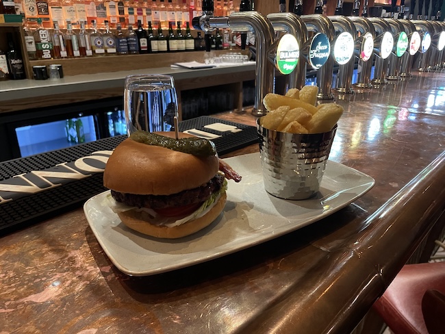 a burger and fries on a plate