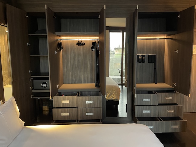 a room with a bed and closet