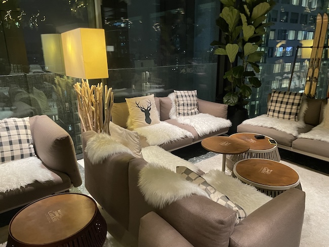 a room with couches and tables