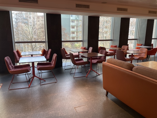 a room with tables and chairs
