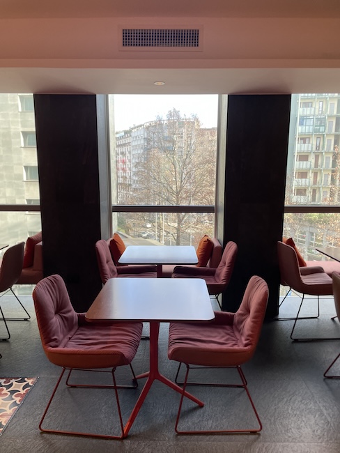 a room with tables and chairs