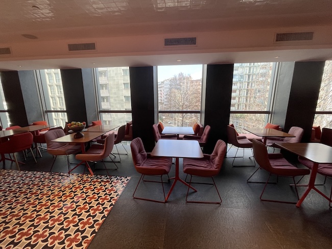 a room with tables and chairs