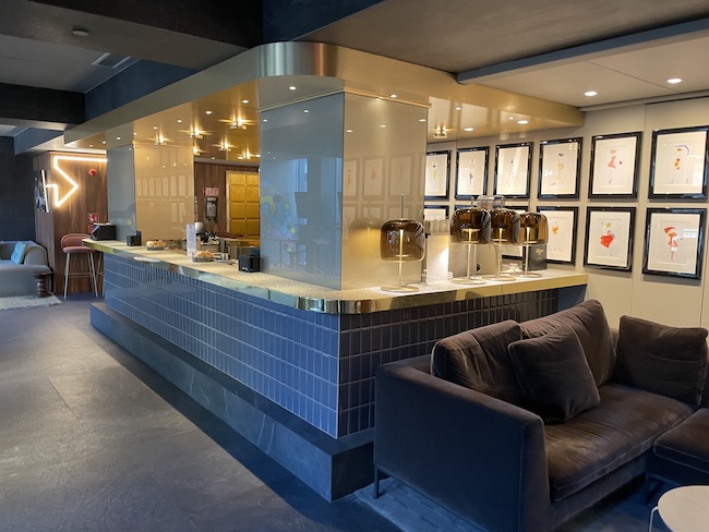 a bar with a couch and a couch in the middle