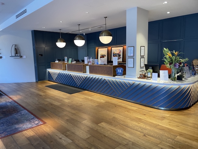 a reception desk in a hotel