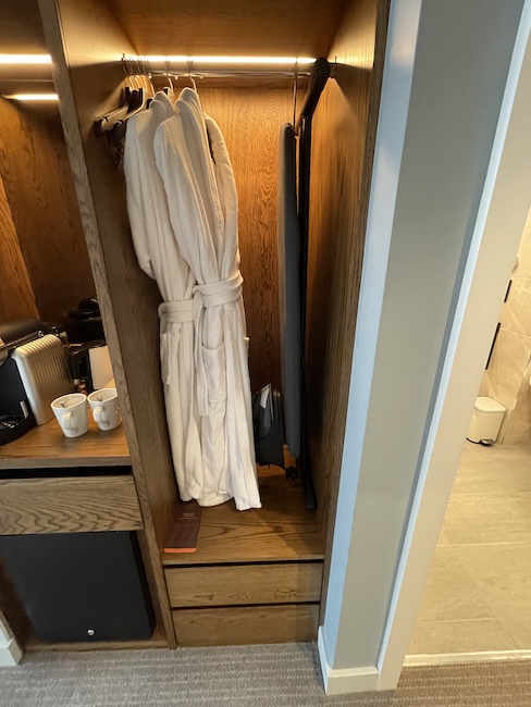 a white robe in a closet