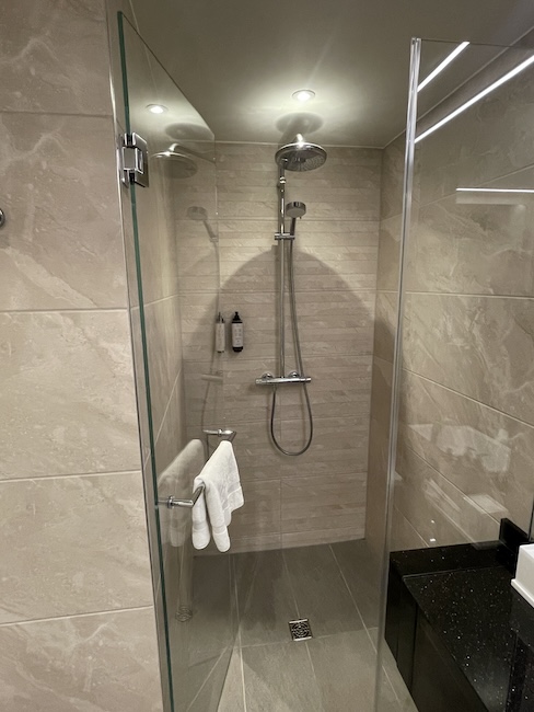 a shower with a glass door