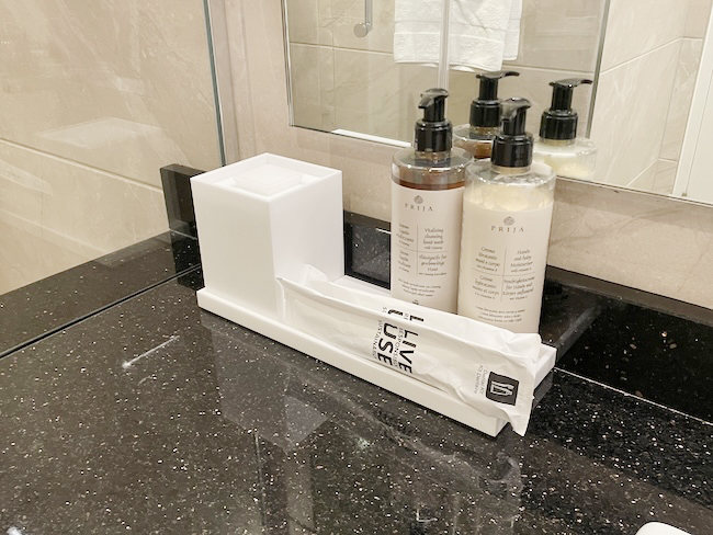 a group of bottles of liquid on a counter
