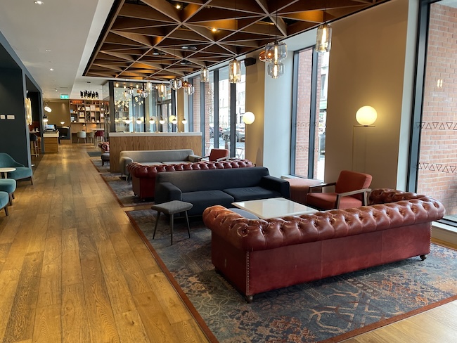 a room with couches and tables