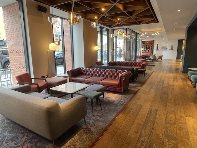 a room with couches and tables