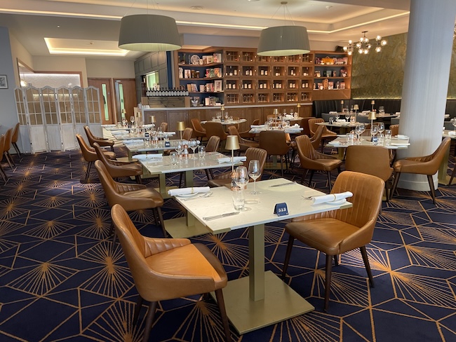 a room with tables and chairs