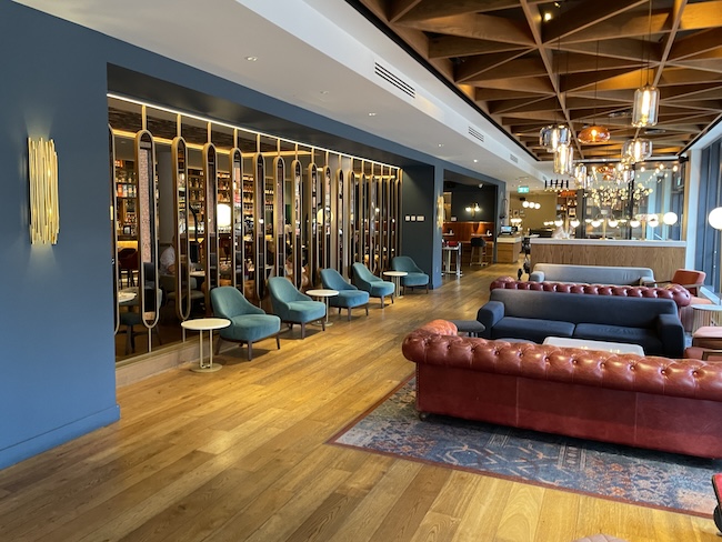 a room with couches and chairs