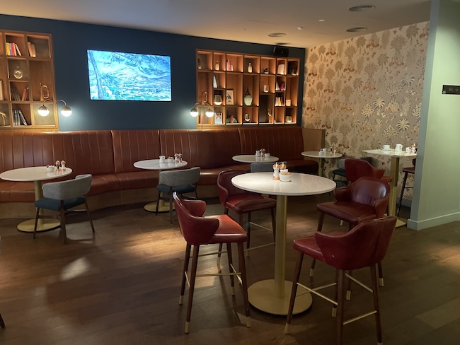 a room with tables and chairs