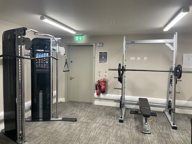 a gym with weights and exercise equipment