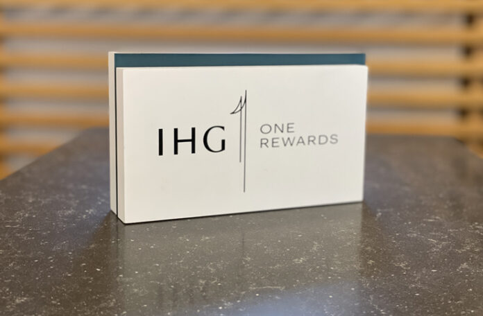 a white rectangular sign with black text on it